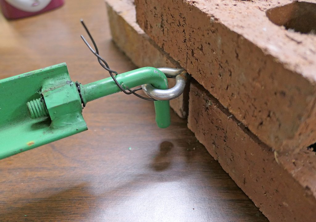 Wall Tie-In Bracket System for Non-Stop elevating scaffolding